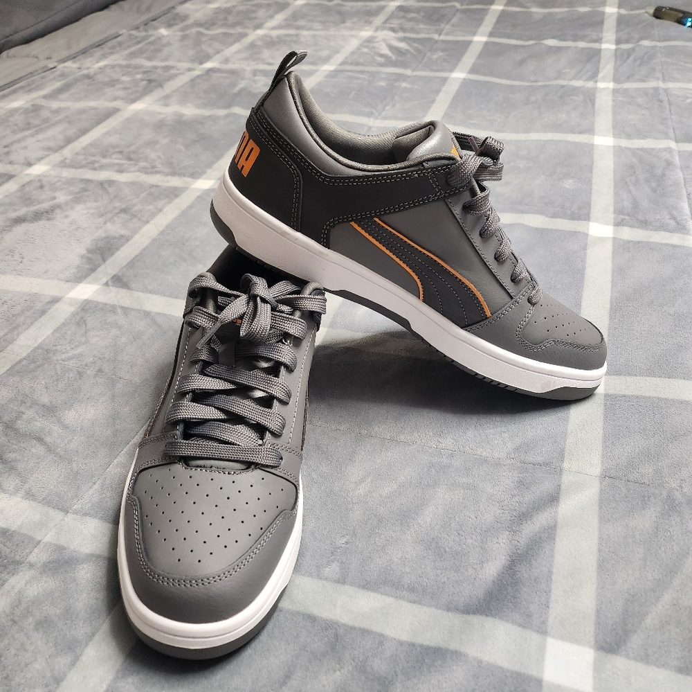 New men 10.5 Puma tennis gray w/orange trim